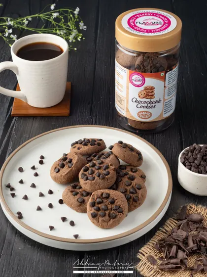 A classic pairing of choco-chip cookies and coffee. I used a dark, rustic background to create a cozy and indulgent atmosphere, making the cookies the star of the scene.