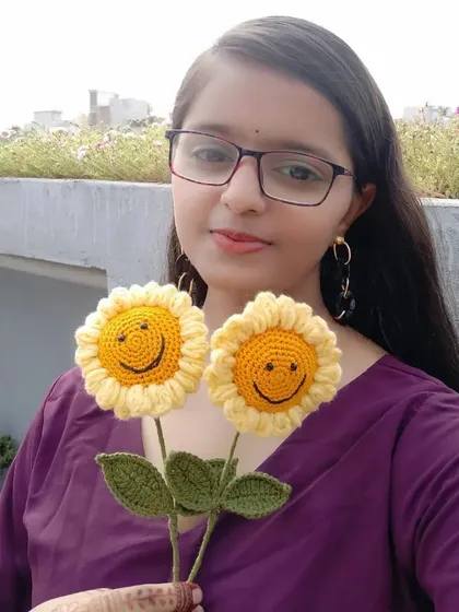 Here I am with a couple of our cheerful smiley sunflowers. Being able to create and share these little pieces of happiness is what makes our work so rewarding.
