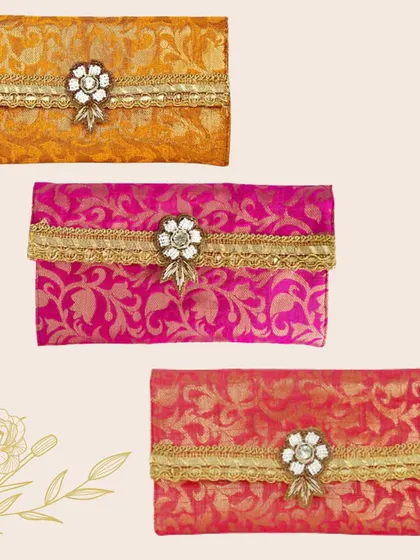 These brocade cash envelopes come in a range of rich, jewel-toned colors. The traditional fabric is elevated with a beautiful, sparkling centerpiece.