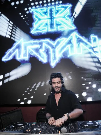 My logo blazing on the screen behind me at Lacena, Thane. A great shot of me in my element.