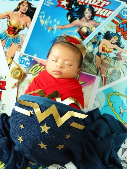 Another powerful shot from the Wonder Woman series. The iconic costume and logo are prominently featured, creating a vibrant and inspiring portrait.