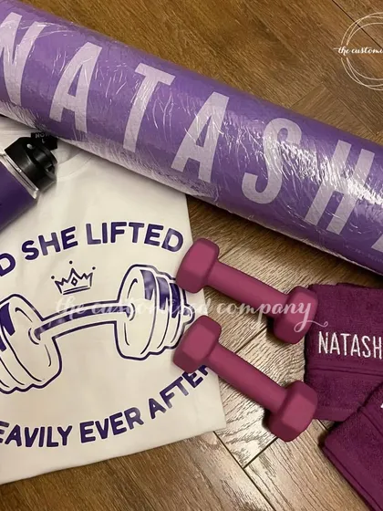 For the fitness enthusiast in your life, we curate motivational workout sets. This collection includes a personalized yoga mat, a custom t-shirt, matching towels, and a sipper bottle to inspire their fitness journey.