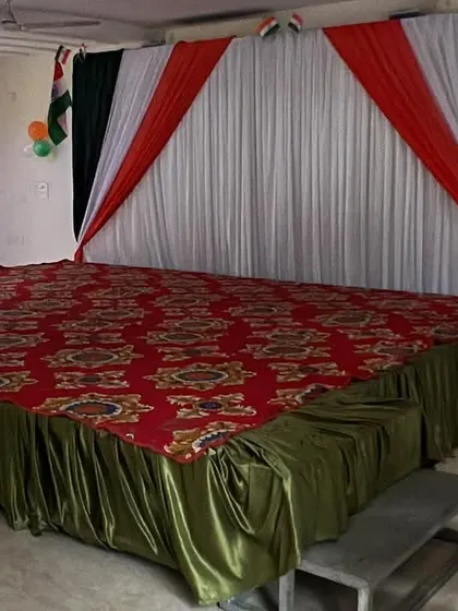 This shows the complete stage before the event, ready for presentations or performances. I ensure the setup is neat and professional.