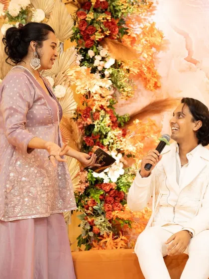 Handing over the mic to the father-to-be. I encourage participation from everyone to make the celebration truly about the family and their story.