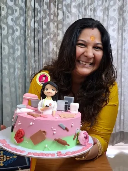 Another shot of me with my surprise anniversary cake. Pure happiness!