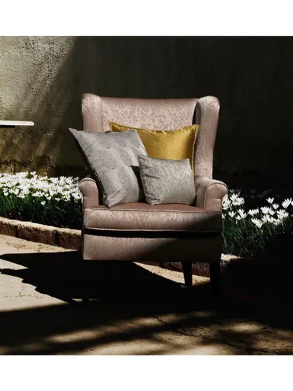 The 'Topkapi' fabric is a fresh, modern take on the classic paisley print. Rich and regal, this exquisite fabric is perfect for a statement armchair or luxurious cushions.