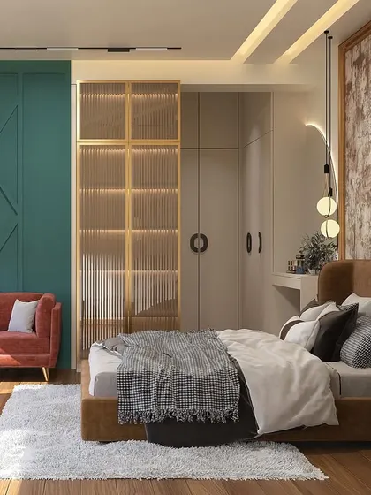 A different angle of the luxurious bedroom, highlighting the contrast between the rustic back wall, the bold teal accent wall, and the warm tones of the small sofa and wooden flooring.