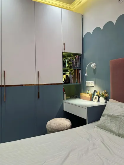 Another view of the integrated wardrobe and study desk, a practical solution for a child's room that needs to serve multiple functions.