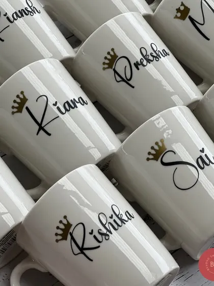 A classic gift that never goes out of style. Our white ceramic mugs are personalised with a name and a crown, making them a perfect and elegant return gift for any occasion.