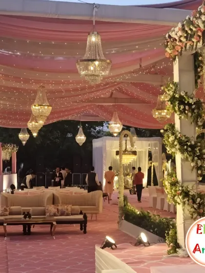 I transformed this large venue into a dreamy wonderland for a Sangeet night. By draping the ceiling with soft pink fabric and weaving in thousands of fairy lights, I created a magical canopy. Crystal chandeliers added a touch of grandeur, setting a romantic and celebratory mood for an evening of dance and music.