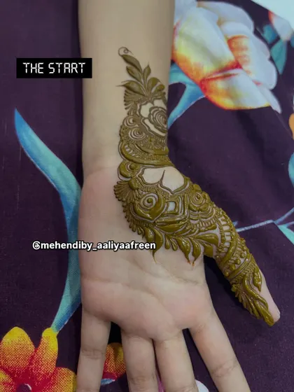 The start of a simple yet elegant design, focusing on a single finger and the back of the hand.