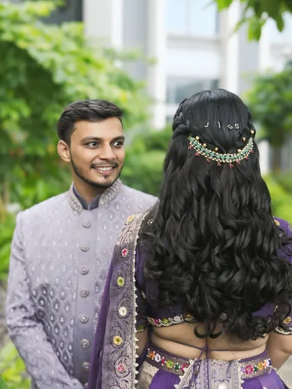 That look of love. This photo captures a sweet moment from their Gordhana, a traditional Gujarati engagement. Her hairstyle features his initials, a personal touch I love to incorporate.