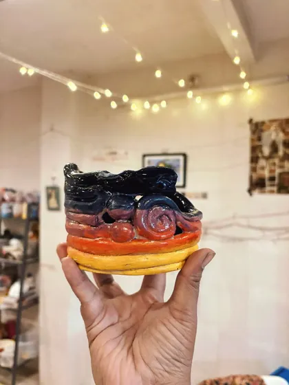 These bright, colorful pieces perfectly reflect the student's sunny personality. From hand-built forms to glazing without fear, she really let herself explore and enjoy the process during her beginner's course.