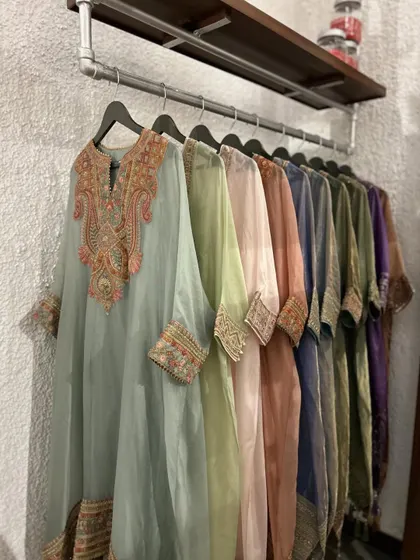A wider view of the pastel organza kurta collection. The light, airy fabric and delicate embroidery make these a perfect choice for summer festivities.