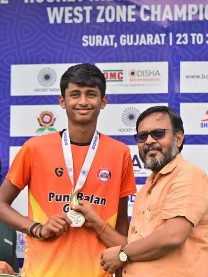 Jordan receiving his silver medal at the West Zone Hockey Championship. A proud moment for him and the academy.