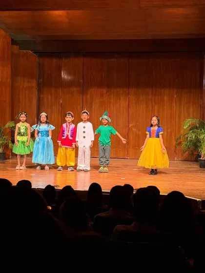Snow White and her friends share a moment on stage during our fairytale medley.