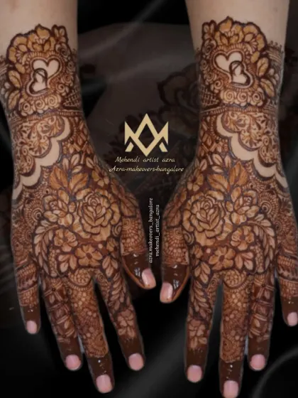 This romantic floral design incorporates heart motifs within the wristband, perfect for an engagement or anniversary.