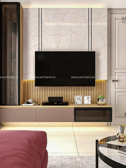 A modern TV unit with a marble-finish back panel and fluted wood accents. The design is clean, sophisticated, and provides ample storage.