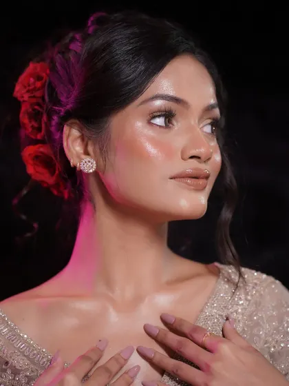 This angle highlights the glow on the collarbones and shoulders, showing that the glass skin technique can be extended to the body for an all-over radiant look.