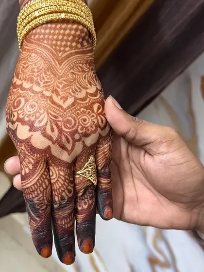 The beautiful, rich brown stain of a mature henna design. This is the color you can expect a day or two after the paste is removed.