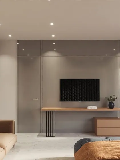 A masterclass in modern minimalism for a teenager's bedroom. The design features sleek, handle-less wardrobes, a floating study desk, and a textured TV wall, creating a sophisticated and uncluttered look.