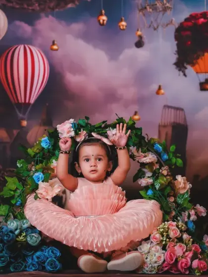 A beautiful baby surrounded by a floral ring in our fantasy world. This shot combines two beautiful elements into one magical photo.