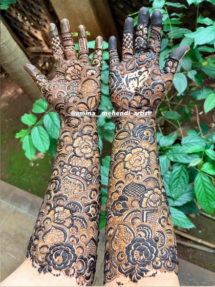 This is an example of my signature full-arm floral mehendi. I love creating dense, intricate patterns with elements like roses, paisleys, and detailed fillers to give you a rich and traditional look for any celebration.
