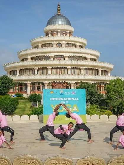 Students from our schools demonstrate a creative group yoga formation. We believe in making yoga joyful and accessible for all ages, fostering teamwork and flexibility from a young age.