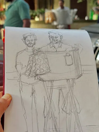 The initial pencil sketch of Sanjay bhaiya, the bhel puri vendor. This shows the first step in my process of capturing a person's likeness and character before adding colour.