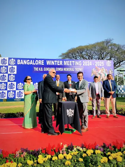 Mr. H.G. Eshwari Prasad presents The H.B. Gundappa Gowda Memorial Trophy.