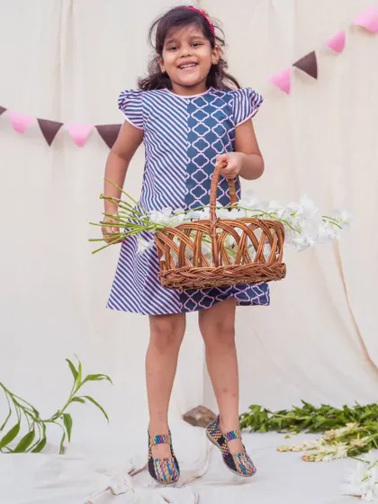 Jumping for joy in this uniquely patterned dress. It’s a great example of how I love to mix prints to create fun, one-of-a-kind pieces.