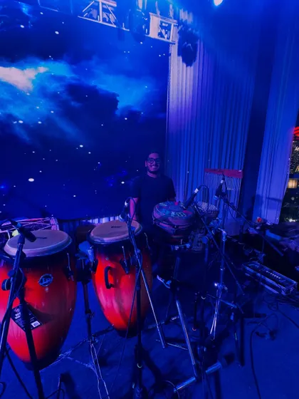My setup often includes space for live musicians, like this percussion rig for an Afro-infused wedding set. This adds an incredible layer of live energy to the celebration.