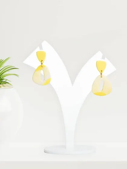 Abstract-shaped yellow earrings, part of the Dazzle Dangles collection. This shot clearly shows the unique design for customers browsing online.