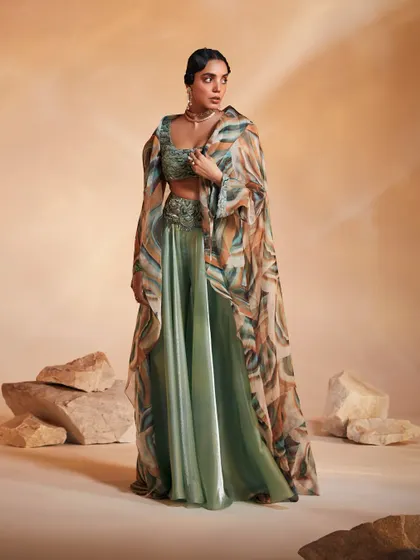 The Adoree Cape Set, a perfect balance of modern print and traditional embellishment, designed to make a statement.
