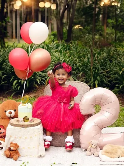 Turning two is a big deal. This outdoor birthday shoot with balloons and teddy bears is a wonderful way to celebrate another milestone.
