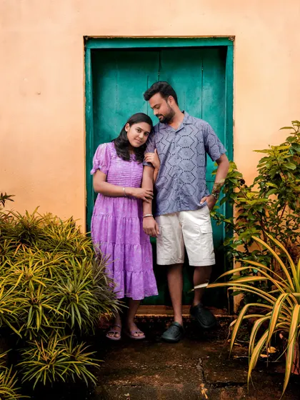 The vibrant colors of Pondicherry's French Quarter make a perfect backdrop for a relaxed couple shoot.