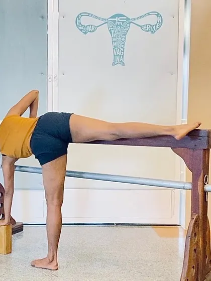 Supported asanas are not just for beginners. Using a prop like this bench in Ardha Chandrasana (Half Moon Pose) allows for a longer, more investigative hold. This helps us refine alignment and experience the therapeutic qualities of the pose more deeply.