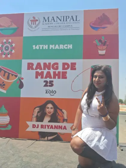 Another pose next to the Rang De Mahe '25 banner. I was so excited to bring my music to this massive university event.
