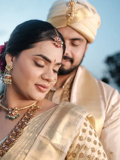 An intimate close-up, showing the soft, romantic makeup that enhances Nishitha's features.