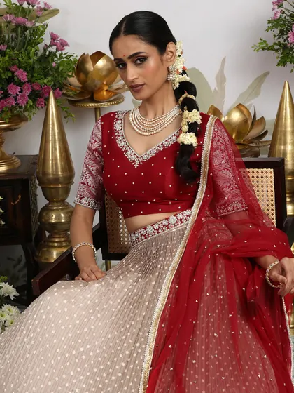A seated view that exudes timeless elegance, perfect for a classic bridal portrait.