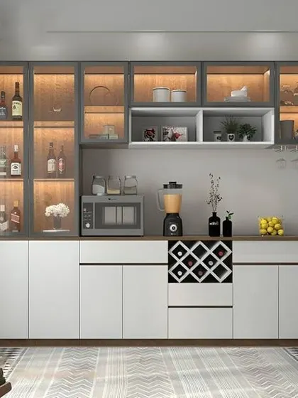 This sleek, modern sideboard includes a built-in wine rack, glass-fronted cabinets with lighting, and space for a microwave and blender. It's an all-in-one solution for a dining or kitchen area.