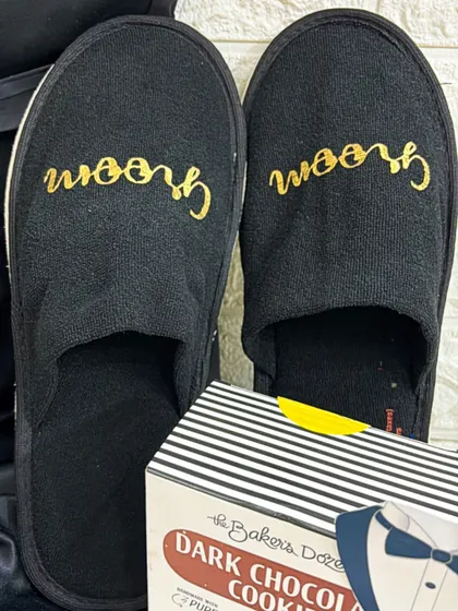 Another look at the personalized 'Groom' slippers, paired with a box of delicious dark chocolate cookies.