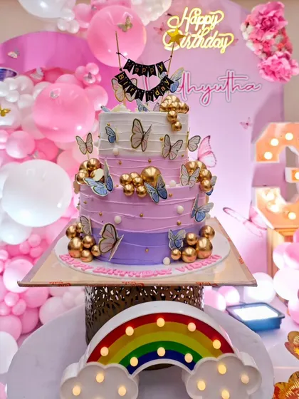 A close-up of the beautiful butterfly-themed birthday cake.