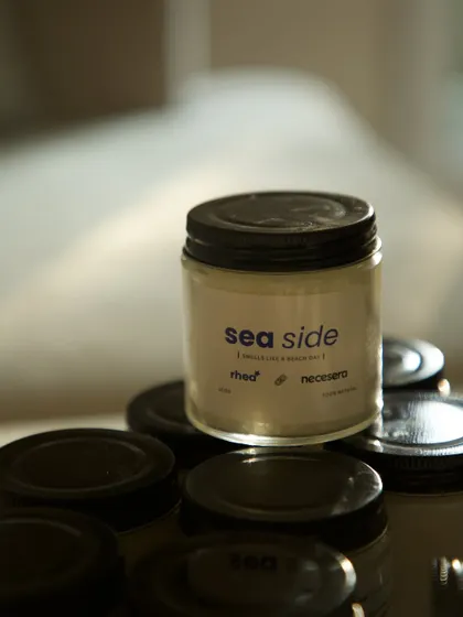A custom "Sea Side" scented candle I crafted for the PR packages celebrating the launch of the Necessara and Rhea Kapoor collection. The scent was chosen to evoke a specific mood and complement the collaboration.