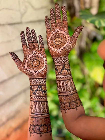 An artistic shot of the personalized bridal mehendi, showing the full length of the design.