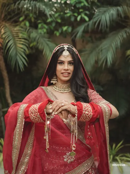 A happy, confident bride. The matte brown makeup look is versatile and suits all skin tones, making it a popular request.