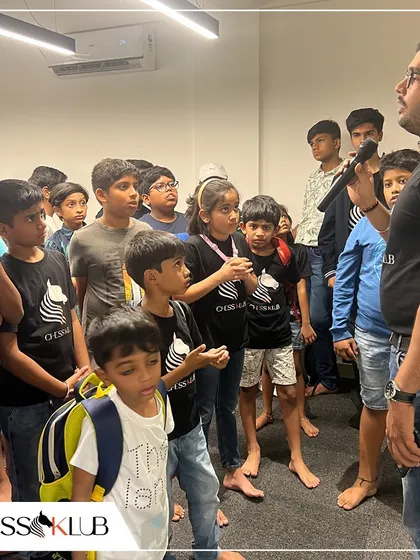 A coach addresses our young players before the start of the Independence Day tournament, offering last minute tips and encouragement. Guidance is a key part of our event structure.