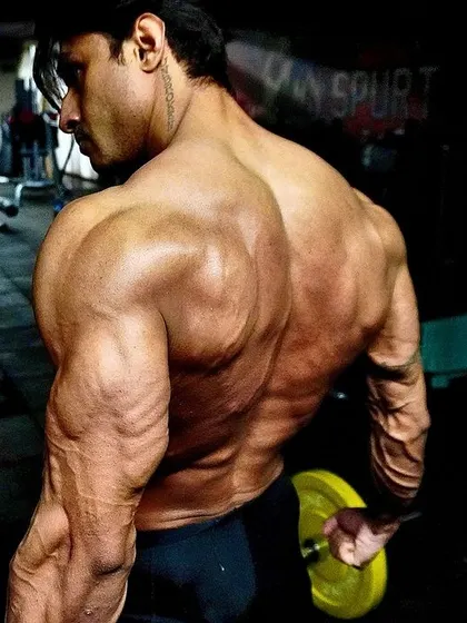 Sometimes the best plan is no plan. Just do what feels right. This back shot captures a moment of instinctual posing and trusting the process.