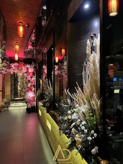 The entrance to the party was designed with an impressive display of pampas grass and dried florals, setting a warm and inviting tone from the moment guests arrived.