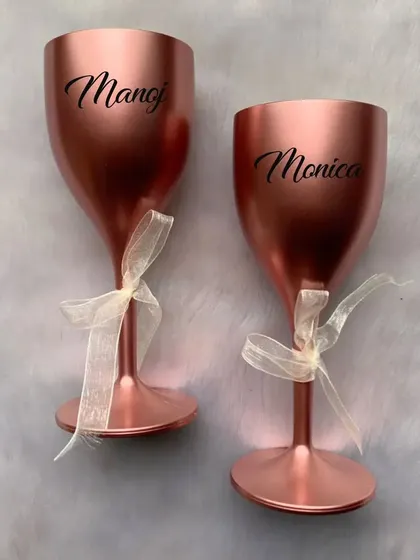 Celebrate together with these personalized unbreakable wine glasses. This rose gold set is engraved with the couple's names, perfect for an anniversary or wedding gift.